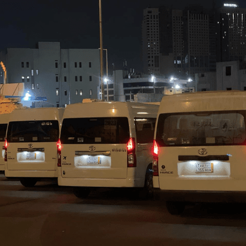 Umrah taxi service vehicle with a comfortable interior, ready for pilgrims.